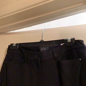 Women’s black slacks. Stretch material. Slim look New with tags